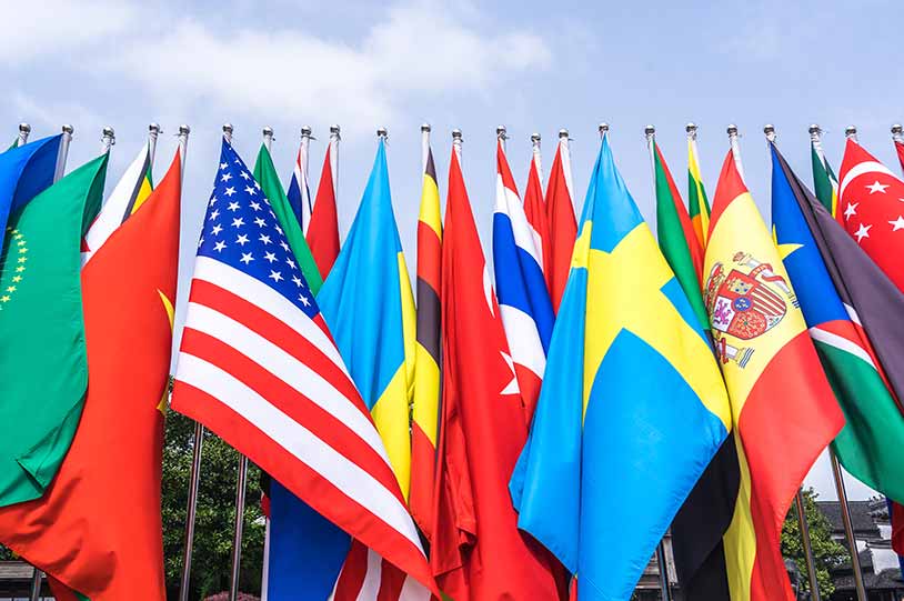 Row of flags of various countries, including the U.S. flag